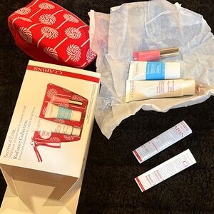NEW Clarins Skincare Set - Red & White Cosmetic Bag -"Secrets d'Eclat" Set
